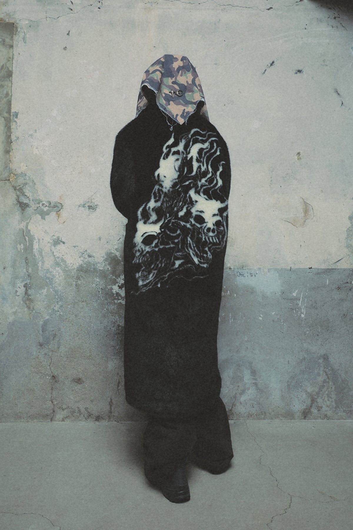 THREE RIDING SKULL FUR COAT
